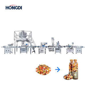 Machine de remplissage de granulés entièrement automatique électrique avec ligne d'embouteillage multi-têtes pour noix, bonbons et chocolat - Product Image 2