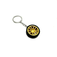 Porte-clés créatif en métal en forme de roue de voiture de dessin animé, porte-clés turbo, porte-clés jante de pneu simulée pour les amateurs de voitures - Vente en gros