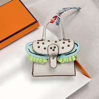 Porte-clés mignon en forme de mini-hamburger, porte-monnaie, étui pour écouteurs et rouge à lèvres avec motif géométrique en cuir