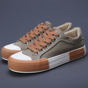 Chaussures de skate décontractées vulcanisées légères, souples et respirantes en toile blanche à lacets pour hommes, qualité supérieure, directement de l'usine - Product Image 1
