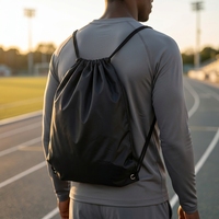 Sac à dos à cordon en polyester 210D imperméable grande capacité avec logo personnalisé pour la gym, les sports et les activités de plein air