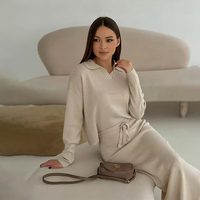OWM ODM hilo hilado con núcleo Jersey de solapa tejido por ordenador para mujer Falda recta delgada para mujer Falda jersey para mujer traje de dos piezas