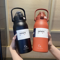 Vente en gros de bouteille d'eau portable en acier inoxydable 316 chaude et froide à double paroi de sport de qualité alimentaire avec logo personnalisé avec poignée et couvercle