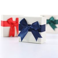 Boîte cadeau en carton pour montre bracelet avec logo personnalisé OEM, emballage pour chaussettes, boîte en papier avec décoration de ruban et nœud