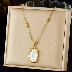 Gold Plated Oval Pendant Necklace With Rose Carving Stainless Steel Chain Everyday Wear Jewelry - Product Image 1