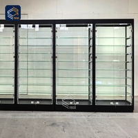 Vitrine en verre au détail à cadre en métal noir Vitrine en verre trempé Full Vision Verrouillable Design de vitrine de magasin