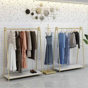 Espositori per Negozi di <span class=keywords><strong>Abbigliamento</strong></span> Femminile in Ferro Dorato di Alta Qualità, Combinazione di Rastrelliere da Pavimento e da Parete per Vetrine Premium - Product Image 5