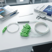 Répartiteur PLC à fibre optique en micro-tube d'acier 1x8 SC/APC CE RoHS à faible perte d'insertion OEM pour réseau FTTH GPON