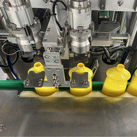 Machine automatique de capsulage de bouteilles de détergent pour capsuleuse d'applicateur de vissage de bouchon à vis