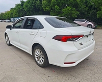 Corolla 2021 1.2T Automatique Édition Elite PLUS d'occasion, conduite à gauche, sièges en cuir, caméra de recul, 4L - Vente Flash