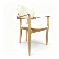 Fauteuil de salle à manger en bois massif pour hôtel avec assise en cuir et dossier ovale