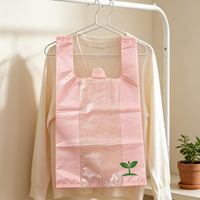 Sac d'épicerie en plastique transparent rose clair avec logo Eco-Style Green Seedling pour l'emballage des boissons, des collations et des courses quotidiennes en supermarché