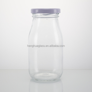 Wholesale 150ml <strong>200ml</strong> 250ml 500ml Round Glass <strong>Milk</strong> Bottles Empty Clear Fruit Juice Glass Bottle with Metal Lids - Product Image 4