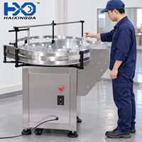 Machine d'alimentation rotative semi-automatique pour bouteilles, plateau tournant pour le débouclage et le tri des bouteilles en plastique pour l'emballage de bouteilles de shampoing