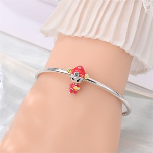 This adorable <b>silver</b>-plated white brass pendant, inlaid with zircon, features a cartoon Chinese New Year design - Product Image 5