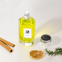 Botella de perfume cilíndrica acanalada de lujo de 30ml, 50ml y 100ml, diseño de vidrio transparente con tapa y embalaje personalizables