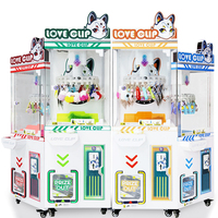 Machine de jeu d'arcade miniature à monnayeur pour parc d'attractions, avec design durable multicolore, acceptant les billets de banque en japonais, espagnol, anglais et offrant des prix en espèces.