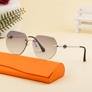 Gafas de sol personalizadas sin montura con corte de diamante para mujer, lentes de PC con protección UV400, estilo Instagram, montura grande, sensación de alta gama - Product Image 1