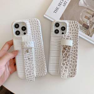 Étui de téléphone de luxe à texture <span class=keywords><strong>crocodile</strong></span> avec dragonne pour <span class=keywords><strong>iPhone</strong></span> 17 16 15 14 13 12 Pro Max, housse de protection élégante en cuir Pu - Product Image 1