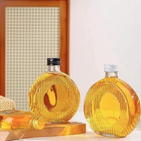Luxe 50ml 100ml 200ml 250ml cilindrische glazen drankenverpakking voor sap, wodka, wijn, lege fles met schroefdop en zeefdruk