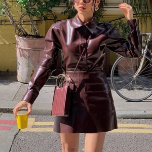 ชุดหนังผู้หญิงคุณภาพสูงแบบ OEM สั่งทำพิเศษ สไตล์เท่ๆ แจ็คเก็ตติดกระดุม กระโปรงทรงเอ สั้น สไตล์มอเตอร์ไซค์ ชุดหนังสองชิ้น - Product Image 2