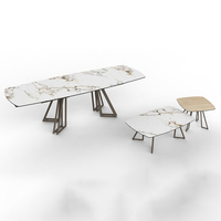 Grande table à manger extensible au design italien moderne avec plateau en céramique et cadre en acier au carbone pour salle à manger, maison et hôtel