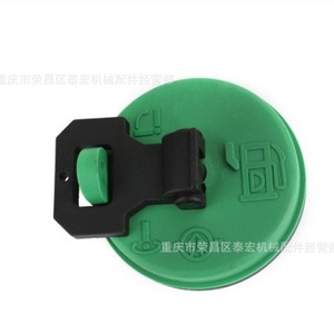 ฝาถังน้ำมันรถขุดแคตเตอร์พิลลาร์ รุ่น 142-8828 พลาสติกสีเขียว พร้อมคลิปหนีบสีดำ สำหรับฝาถังดีเซล - Product Image 1