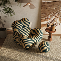 Fauteuil UP 50 Style Mamma's Hug, fauteuil lounge tout en mousse avec tissu rayé et ottoman en forme de boule