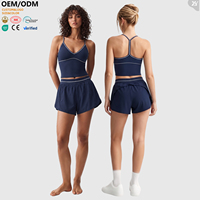 Ensemble de vêtements de sport personnalisés avec logo pour la vente en gros : Short de sport extensible quatre directions et soutien-gorge rembourré assorti, tenue douce pour le fitness et le yoga pour femmes