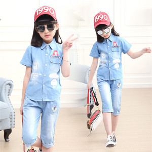 Ropa Infantil Alemana al por Mayor: Pantalones Cortos de Uniforme Escolar Color Caqui y Camisetas Estampadas en Stock - Product Image 4