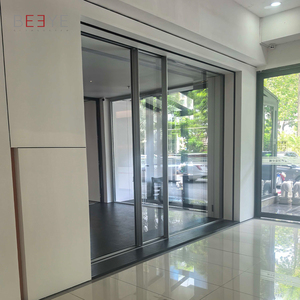 Système de portes coulissantes électriques en aluminium avec cadre en verre trempé certifié NAFS AS2047, portes coulissantes cachées pour patio - Product Image 1