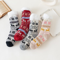 Chaussettes de sol d'hiver pour femmes Chaussettes antidérapantes avec longueur de l'équipage Motifs de points de dessin animé Chaussettes de tapis de neige de confinement chaud à la maison