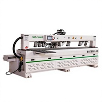 Machine de découpe CNC avec table à vide et système de collecte des poussières pour le traitement des panneaux de bois