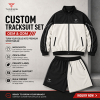 Conjunto Deportivo de Dos Piezas para Hombre con Bloques de Color en Contraste, Chaqueta con Cremallera y Cuello Alto, Pantalones Cortos, Bolsillos Inclinados, Diseño Asimétrico