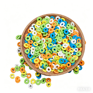 Gâteau coloré garni de tranches espagnoles, de bonbons fins, de décorations florales, de étoiles et de perles de sucre rondes - Product Image 1
