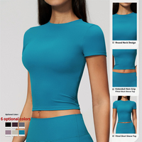 Ensemble short cycliste et crop top à manches courtes avec logo personnalisé pour femme, en tissu brossé, pour yoga et entraînement, vêtements de sport OEM