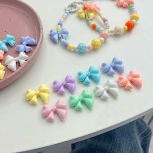 2025 Hot New DIY Accesorios Crema Color sólido Globo Streaming Bow Beads Pintado a mano Acrílico Plástico y Lucite Beads - Product Image 1