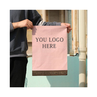 Sacs en plastique de conception de Logo imprimé personnalisé pour vêtements t-shirt sacs en plastique imperméables sacs en plastique noirs
