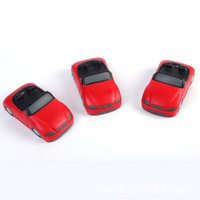 Balle anti-stress souple en PU pour le transport, jouet à presser personnalisé en forme de voiture de sport rouge, balle anti-stress souple pour jouets promotionnels