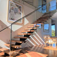 Escalier flottant préfabriqué moderne en acier au carbone à poutre unique avec marches en bois de hêtre/chêne – Conception d'escalier intérieur pour maisons