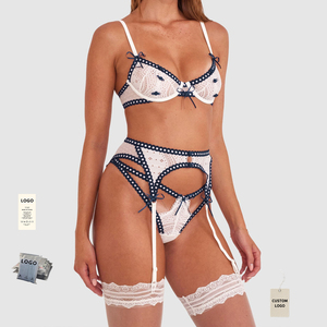 Conjuntos de lencería erótica de encaje hueco para mujer, conjuntos de lencería íntima, conjuntos de lencería con cinturón de liguero, sujetador y bragas blancos al por mayor - Product Image 1
