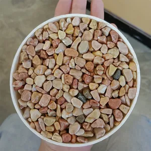 Manufacturers wholesale yellow Gold Irregular stone for gardens pea gravel stone fish gravel