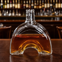 Les fournisseurs de bouteilles en verre personnalisent les bouteilles de vin rondes en verre de 700 ml 1 L et 3 L pour le whisky, la vodka et le brandy.
