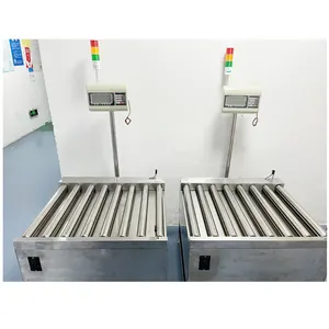Linea di confezionamento alimentare dinamica scatola di cartone bilancia di ispezione industriale nastro trasportatore in linea di ispezione del peso del tamburo