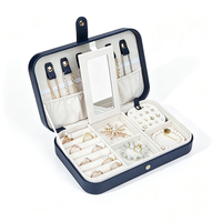 Étui de voyage pour bijoux bleu marine avec boutons-pression, miroir, sangles pour colliers, emplacements pour bagues, porte-cartes pour boucles d'oreilles, intérieur en velours, boîte cadeau