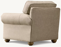 Fauteuil inclinable en tissu de lin style ferme traditionnel, avec accoudoirs roulés et pieds en bois tournés, pour salon
