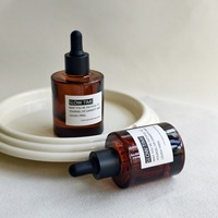 Luxuriöse 30ml 50ml Kosmetik-Serumflasche aus Bernsteinfarbenem Glas für Ätherische Öle mit Schraubverschluss