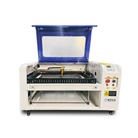 Nouvelle petite machine de gravure et de découpe laser CO2 6040 50W/60W/100W 600x400 de table, refroidie par eau, CNC, pour le bois/MDF/verre/AI
