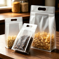 Transparante matte achtzijdig gesealde staande pouch met handvat, voedselveilige ritssluitende verpakkingstas voor snacks en noten