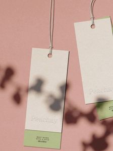Etiquetas de ropa ecológicas impresas a medida con logotipos en relieve son una opción sostenible para calzado y equipaje. - Product Image 3